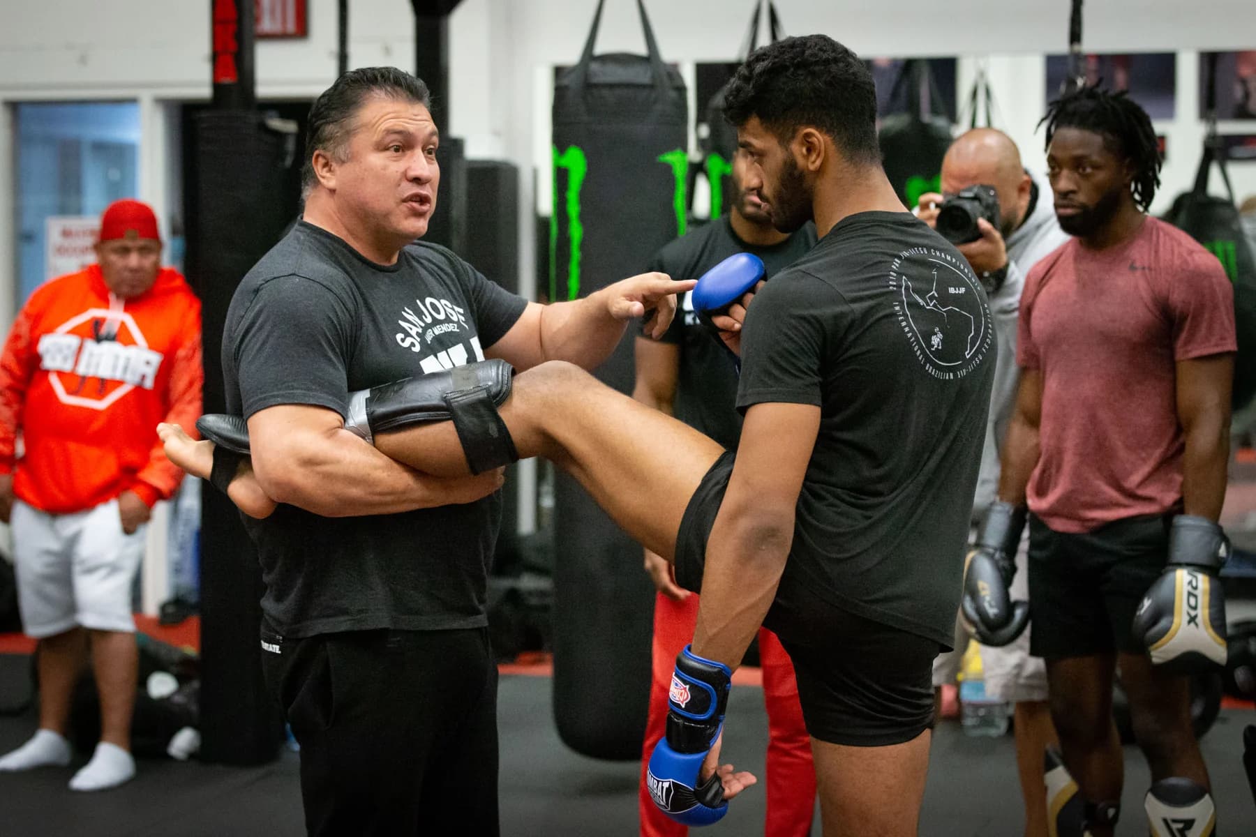 Javier Mendez coaching on the AKA training floor