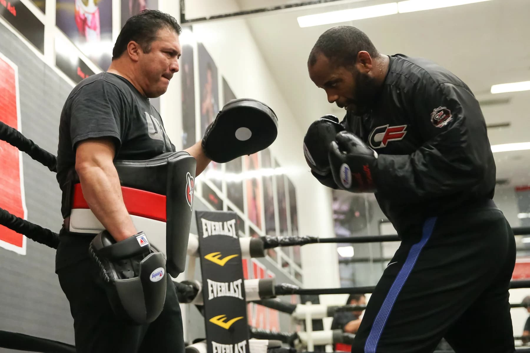 Daniel Cormier working pads with Javier Mendez